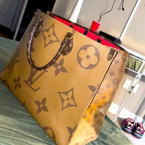 HUGE brown Louis Vuitton bag ... you can wear this bag on both sides ...
